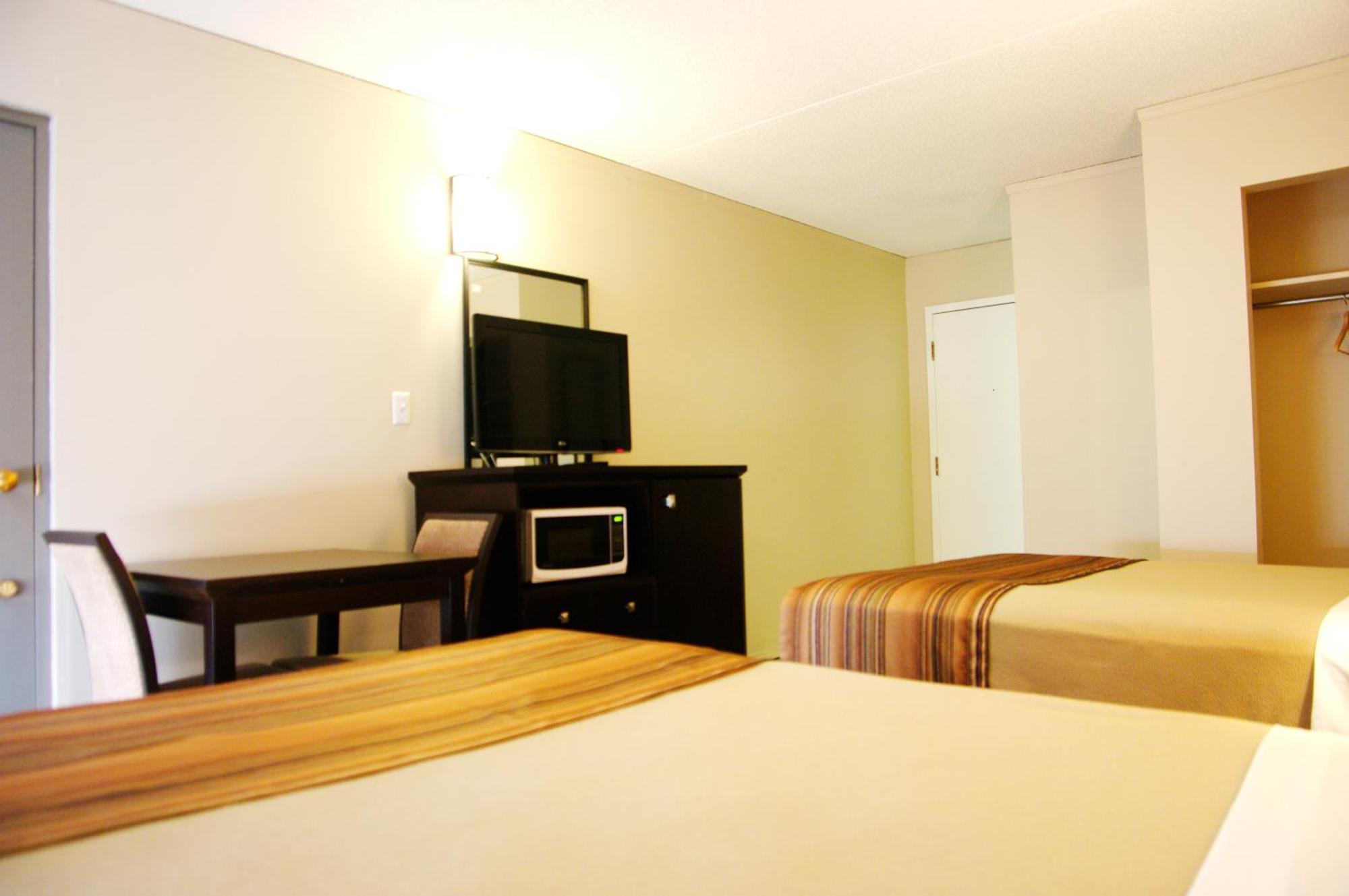 Airport Traveller'S Inn YYC Quarto foto